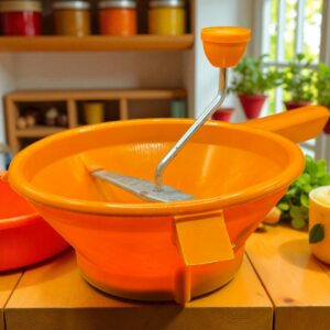 Ancien presse purée à moulin - En plastique et de couleur orange - Datant de 1970 - Vintage - Collection - Décoration