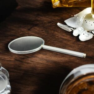 Joli et rare miroir (recto verso) à main en métal argenté - Décor travaillé sur le pourtour - Collection - Décoration - Vintage des années 1960