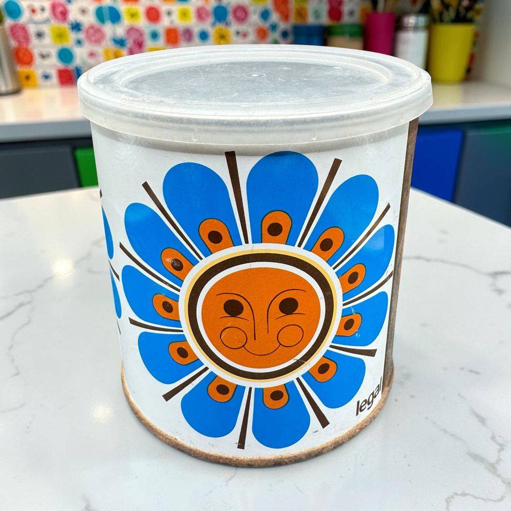Boîte cylindrique en métal lithographié - Maison Legal - Motif de fleur-soleil stylisée design « Flower Power » des années 1970 - Déco - Collection - Vintage